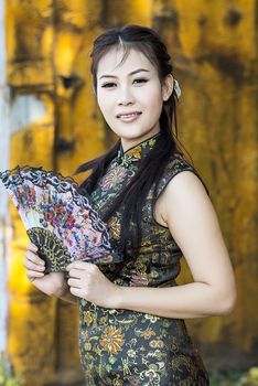 Chinese woman back dress traditional cheongsam ,close up portrait