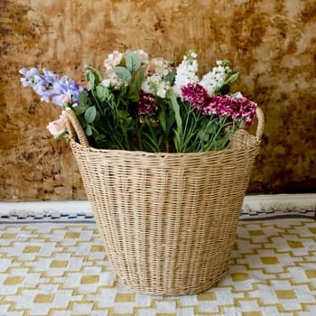 colorful flowers in a basket