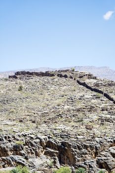 Image of mountains Jebel Akhdar and blue sky in Oman