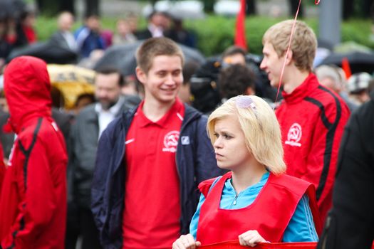 Moscow, Russia - May 9, 2012. March of communists on the Victory Day. Unknown demonstrator of communists