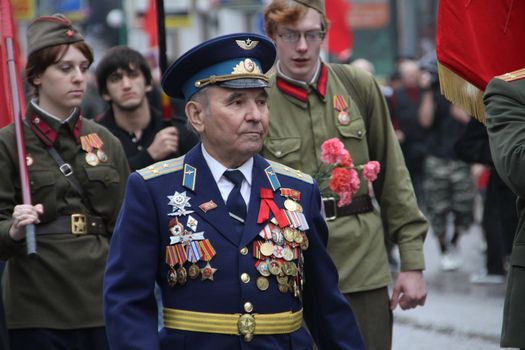 Moscow, Russia - May 9, 2012. March of communists on the Victory Day. 