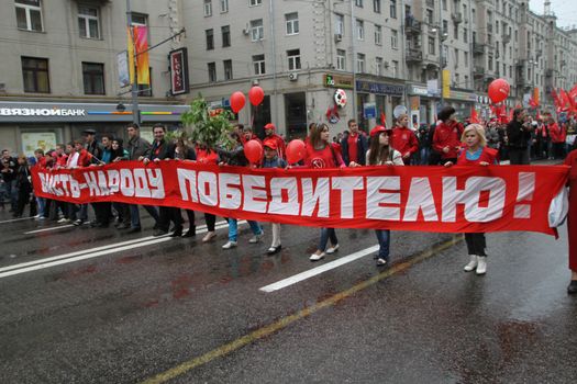 Moscow, Russia - May 9, 2012. March of communists on the Victory Day. 