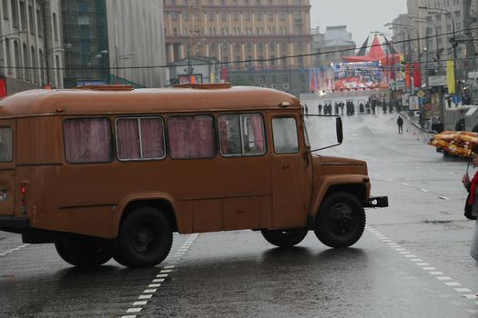 Moscow, Russia - May 9, 2012. March of communists on the Victory Day. Retro the bus on streets of Moscow in day of procession of communists