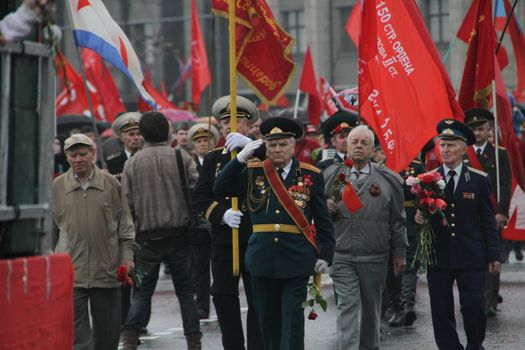 Moscow, Russia - May 9, 2012. March of communists on the Victory Day.