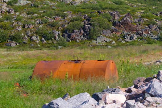 garbage  a barrel among the wild nature