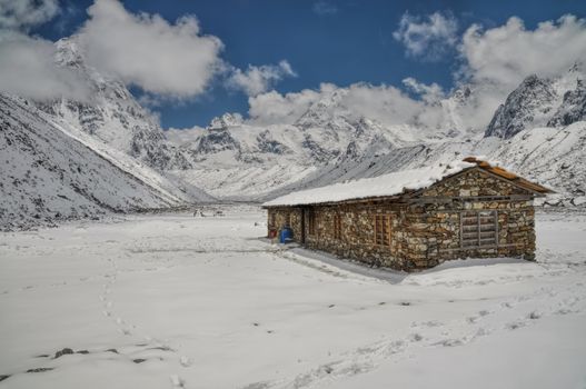 Cabin in high altitude in Himalayas mountains near Kanchenjunga, the third tallest mountain in the world