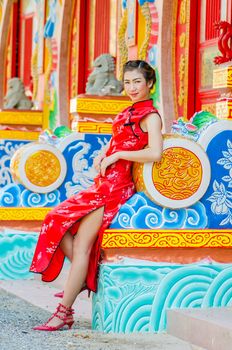 Woman in red dress,Cheongsam dress of Chinese traditional.