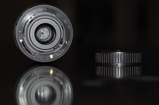 Backside of a camera lens showing optical eye.