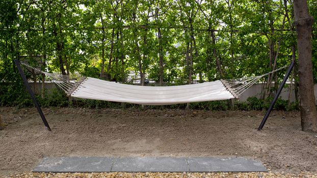 A cradle made from rope near the beach