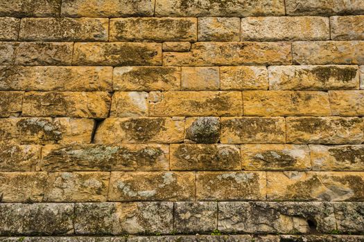 Wall made of large yellow stones