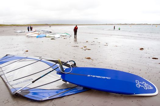 windsurfing champion getting ready to race and surf on the beach in the maharees county kerry ireland