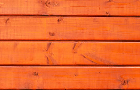 Texture of four red wood planks wall. 