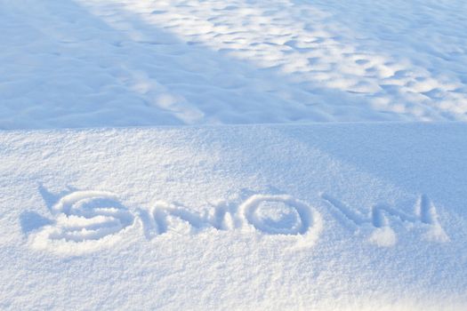Climate description is traced as fingered letters of snow in new snowfall. Word becomes a physical and literal weather report.