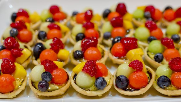 finger food, dessert and fruits cocktail