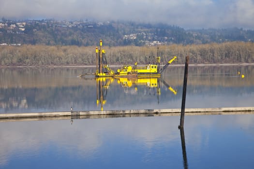 Dredging boats in the Columbia River Oregon.