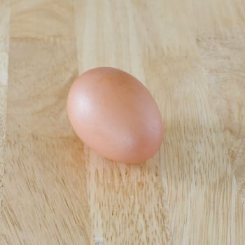 Fresh Egg on wood table