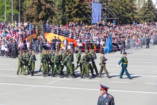 Samara, Russia - May 9: Russian soldiers march at the parade on annual Victory Day, May, 9, 2014 in Samara, Russia.
