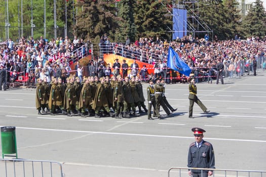 Samara, Russia - May 9: Russian soldiers march at the parade on annual Victory Day, May, 9, 2014 in Samara, Russia.

