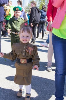 Samara, Russia - May 9: Russian girl at the parade on annual Victory Day, May, 9, 2014 in Samara, Russia.