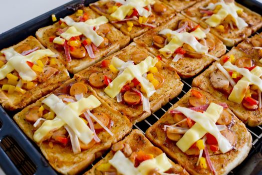 Pizza breads with Cheddar Pheese and Mozzarella cheese Homemade on tray