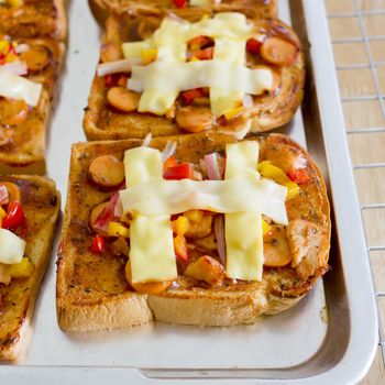 Pizza breads with Cheddar Pheese and Mozzarella cheese Homemade on tray