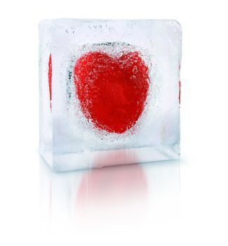 Red heart frozen inside an transparent ice cube block
