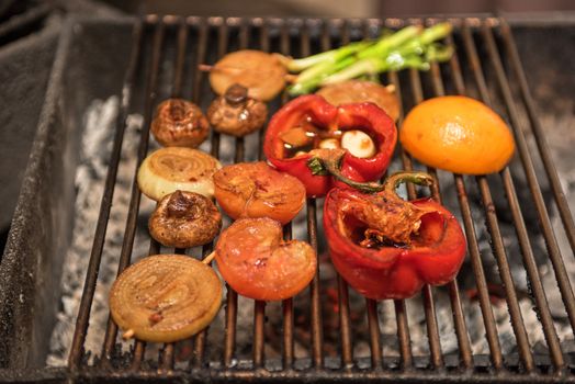 Different vegetables on the grill preparing 