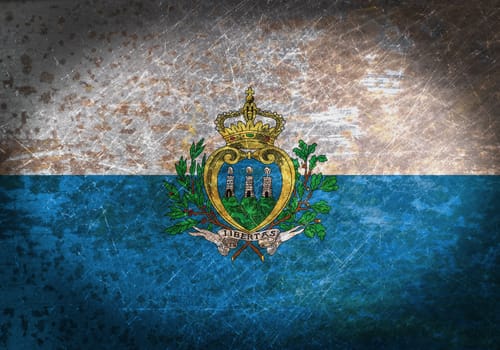 Old rusty metal sign with a flag - San Marino