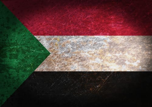 Old rusty metal sign with a flag - Sudan