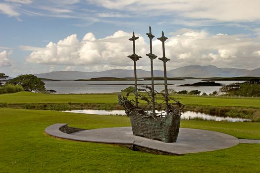 This bronze memorial was erected in memory of the 1845 to 1852 famine, caused by the failure of the potato crops. Many people emmigrated to America but so many died on the journey that the ships became known as coffin ships. A close look at the sculpture reveals the shapes of human bodies as rigging.