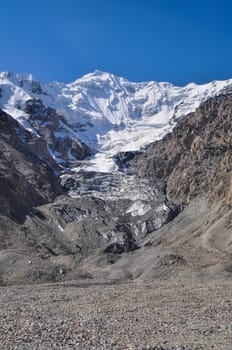 Scenic Engilchek glacier with picturesque Tian Shan mountain range in Kyrgyzstan