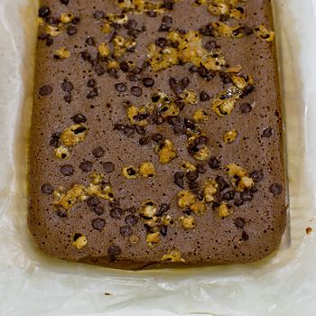 Homemade brownies on wooden background