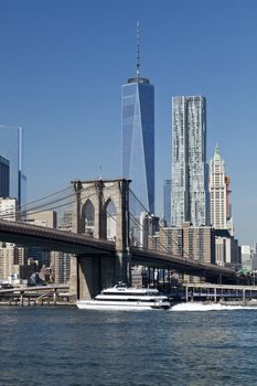 The New York City Downtown w Brooklyn Bridge and Freedom tower