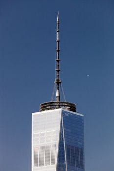 New York, USA, October 3, 2014: The top of the Freedom Tower with 408 feet (124 m) mast containing the broadcasting antenna gave the tower symbolic height of 1,776 feet (541 m)