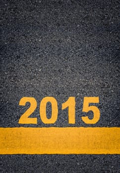 Conceptual Image Of Year 2015 As Yellow Asphalt Road Markings With Single Line And Copy Space