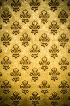 Background Texture Of A Regal, Gold Fleur-de-lis Coat-Of-Arms On Napoleon's Tomb In Paris, France