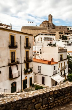 Views inside the old town of Ibiza Town with picturisque old buildings.