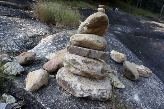 Great pyramid of stones on the background, of wild nature.