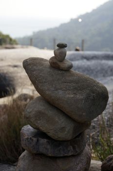 Great pyramid of stones on the background, of wild nature.