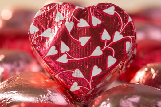 Chocolate Heart with wrapping paper, symbolizing love.