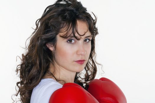 brunette young woman with red boxing gloves