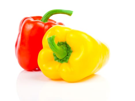 Red and yellow sweet pepper isolated on white background