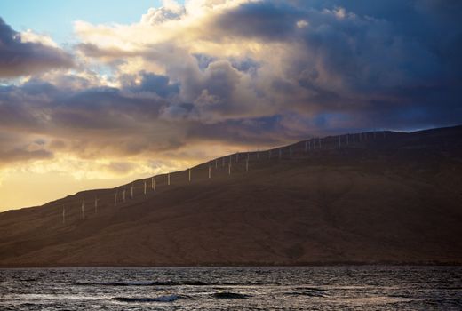 Kahaewa Hawaii Wind Farm on shore of the Ocean