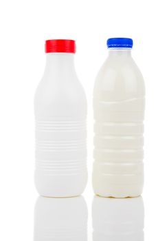 two bottles of milk isolated on white background