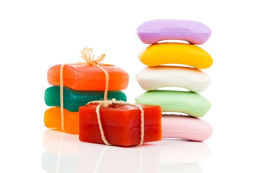 Stack of new colorful Soap Bars on white background.