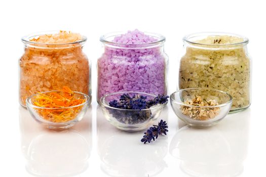 various kinds of bath salt with flowers, isolated on white background