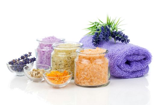 various kinds of bath salt with flowers, isolated on white background