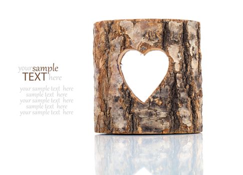 heart cut in hollow tree trunk. on white background