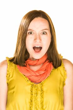 Pretty girl with a shocked expression on white background