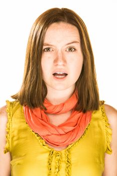 Pretty girl with an unsure expression on white background